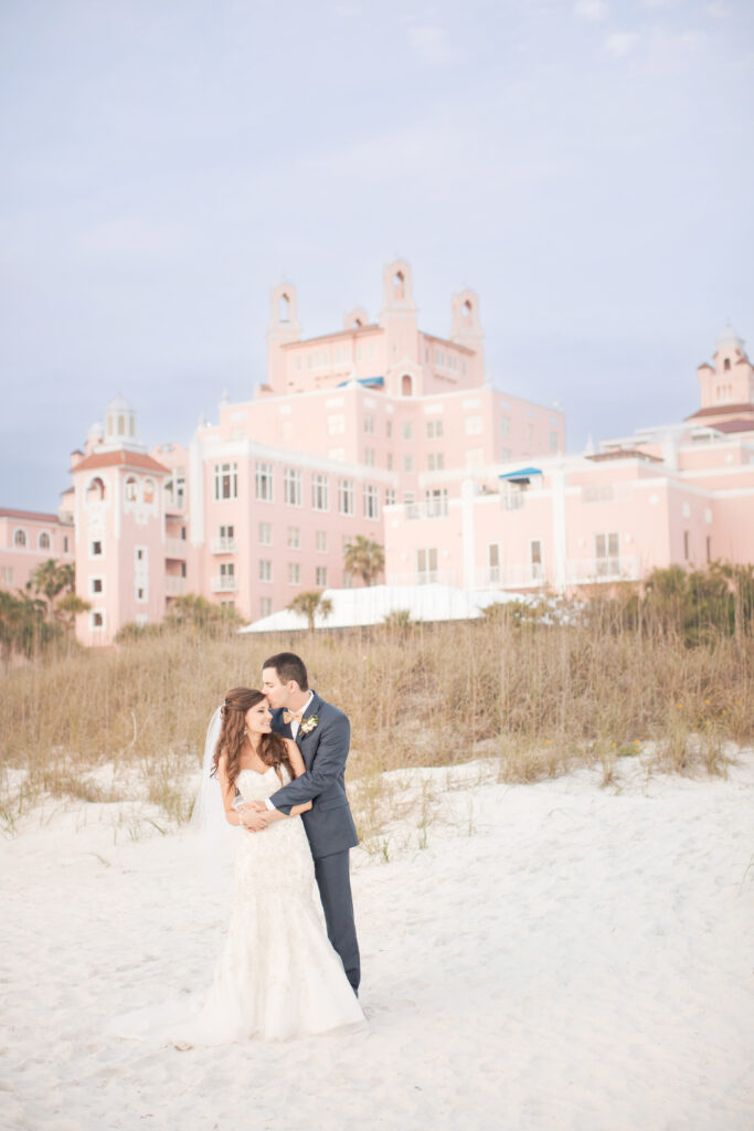Sunset wedding portraits along St Pete Beach near The Don CeSar hotel