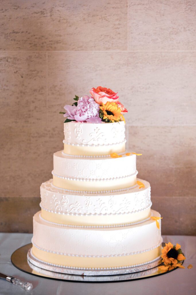 wedding cake with floral details at Powel Crosley Estate Sarasota reception