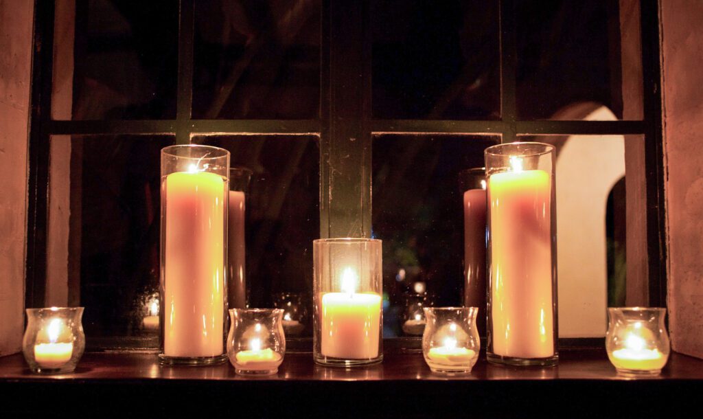 glowing candlelight wedding reception details at Powel Crosley Estate Sarasota