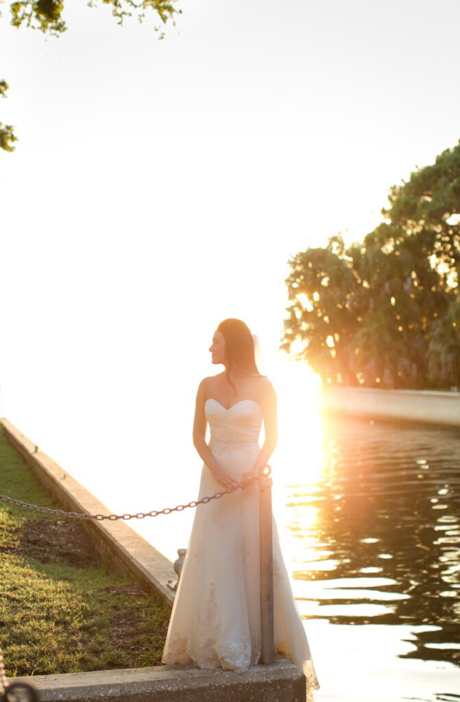 sunset wedding portrait at Powel Crosley Estate Sarasota waterfront golden light