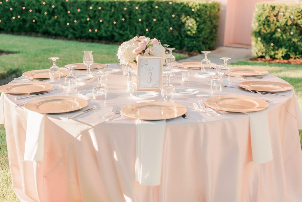 Elegant outdoor wedding reception setup in the courtyard at The Ringling Museum in Sarasota Florida