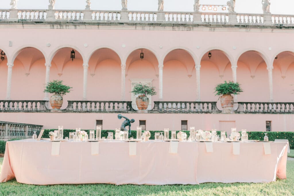 Elegant outdoor wedding reception setup in the courtyard at The Ringling Museum in Sarasota Florida