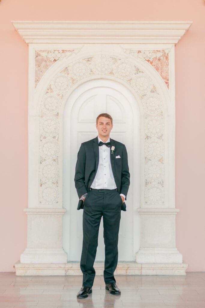 groom portrait in the archway hallway at The Ringling Museum Sarasota Florida