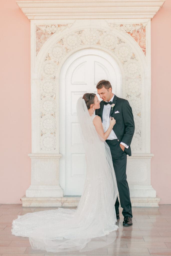 Bride and groom portrait in the archway hallway at The Ringling Museum Sarasota Florida