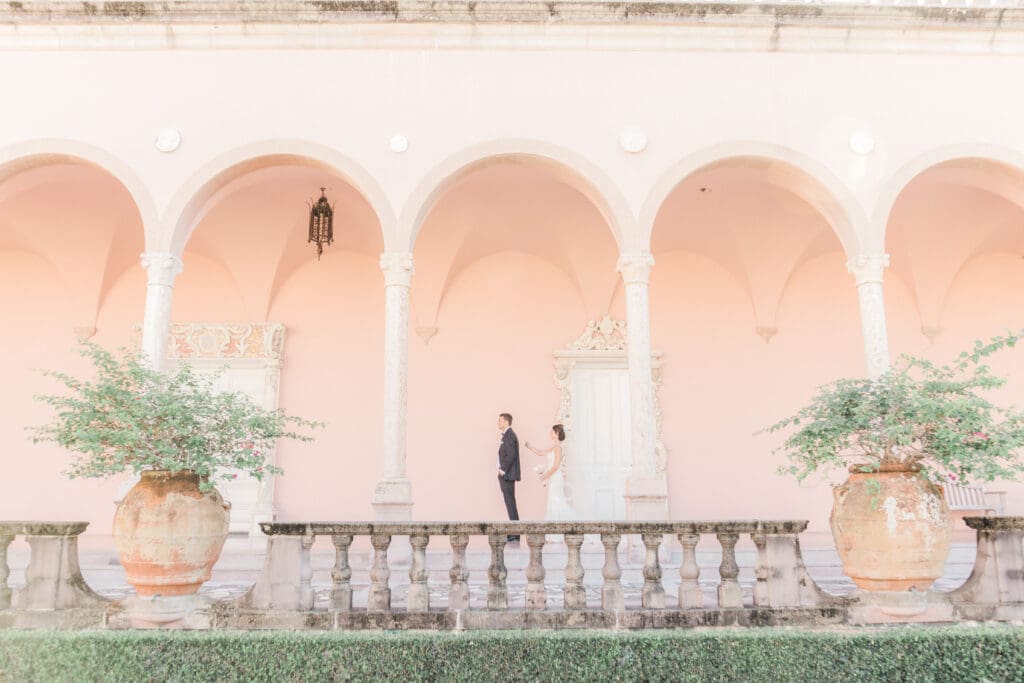 Bride and groom portrait in the archway hallway at The Ringling Museum Sarasota Florida