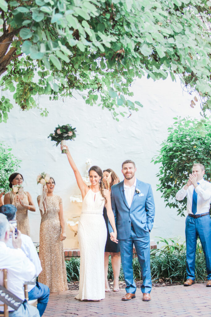 Bride and groom walking down aisle after ceremony at Museum of Fine Arts wedding
