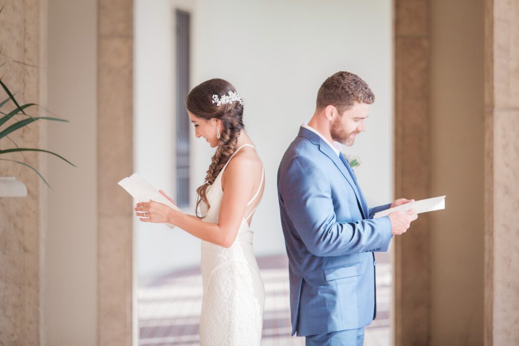 Bride and groom reading letters before ceremony at Museum of Fine Arts wedding