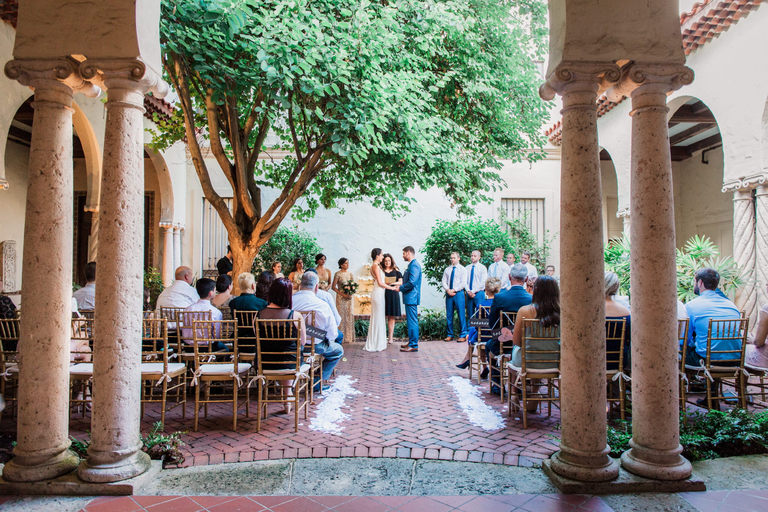 Courtyard wedding ceremony at Museum of Fine Arts St. Petersburg with guests seated