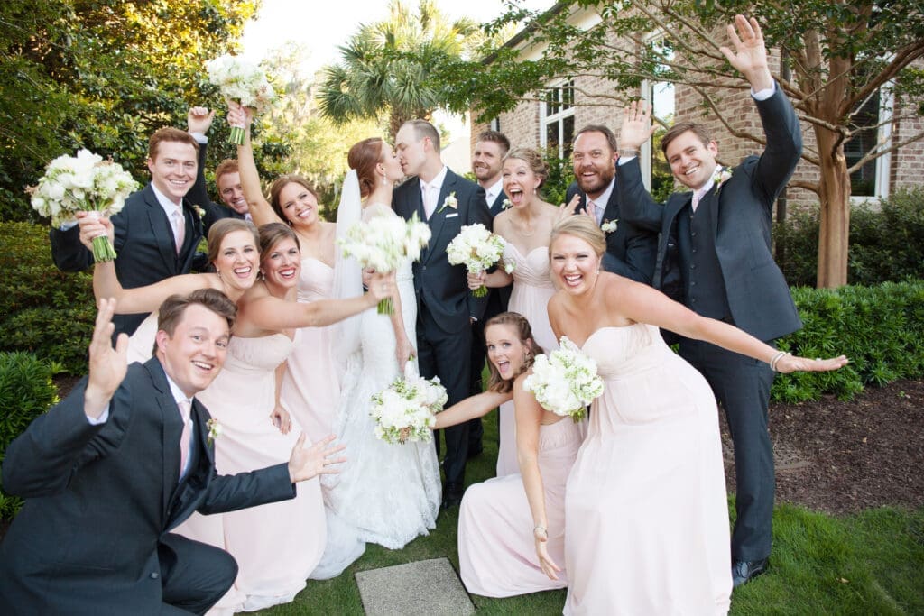 Bridal party celebrating outside Hilton Head wedding venue