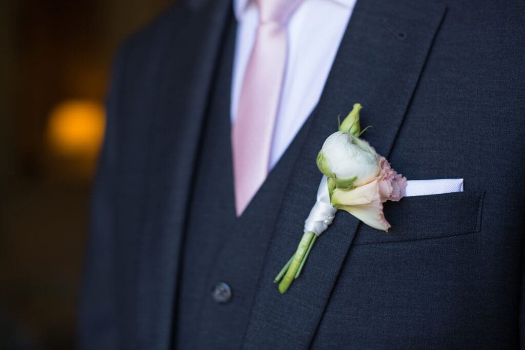 Boutonniere detail on groom suit during Hilton Head wedding