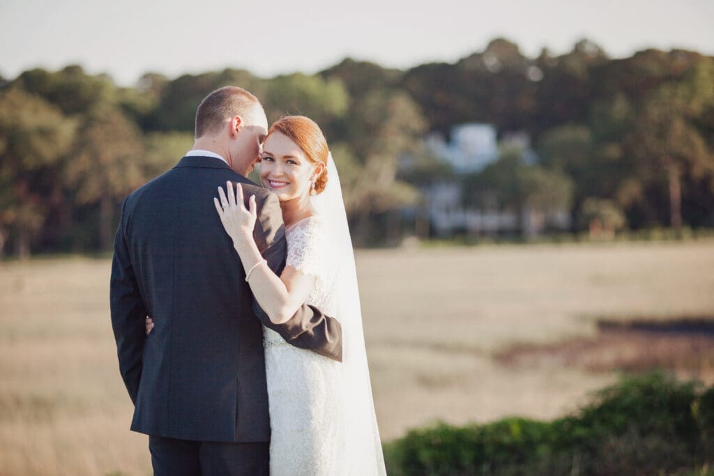 Bride smiling during sunset portrait at Hilton Head wedding
