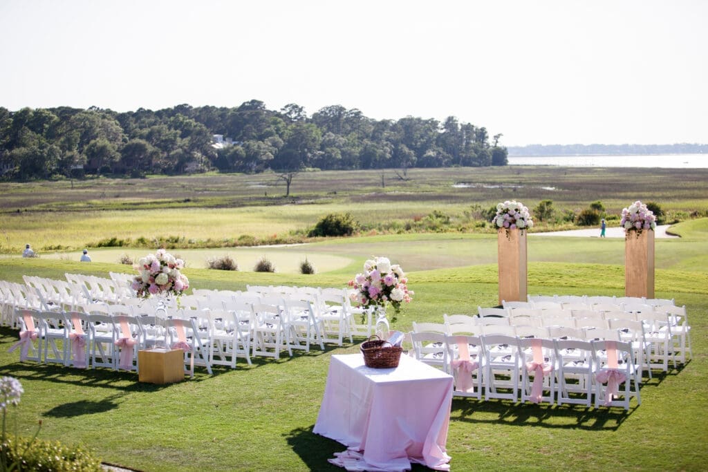 Outdoor waterfront wedding ceremony at Colleton River Club in Hilton Head